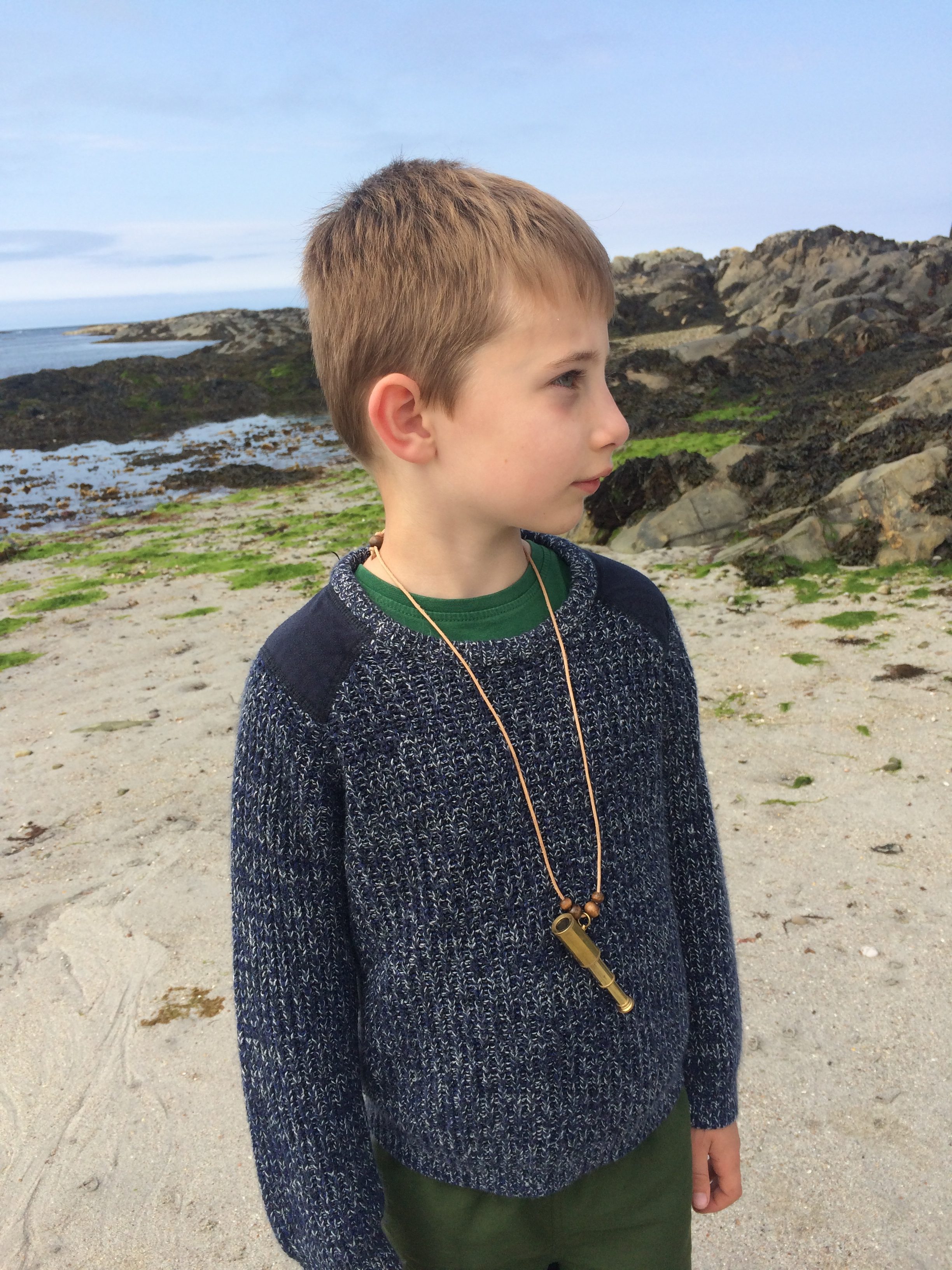 Boy wearing Telescope Necklace